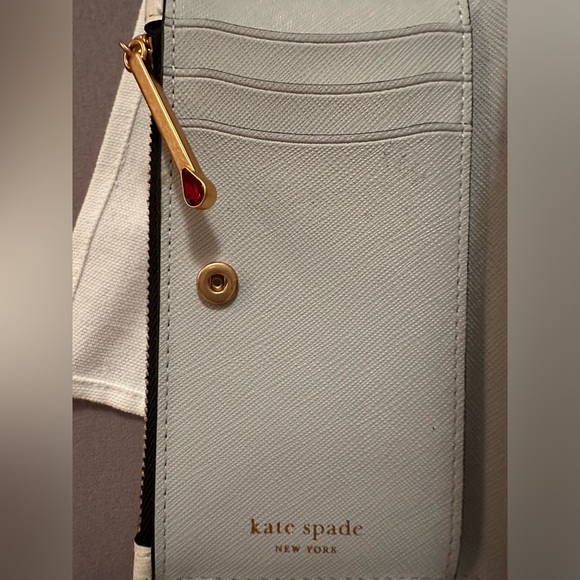 Kate Spade
Morgan Matchbox Embossed Small Slim Bifold Wallet
$118 - Picture 4 of 5